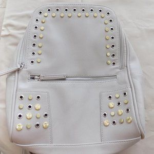 DANIELLE NICOLE BACKPACK BAG BEIGE WITH GOLD & SILVER METAL STUDS ON FRONT